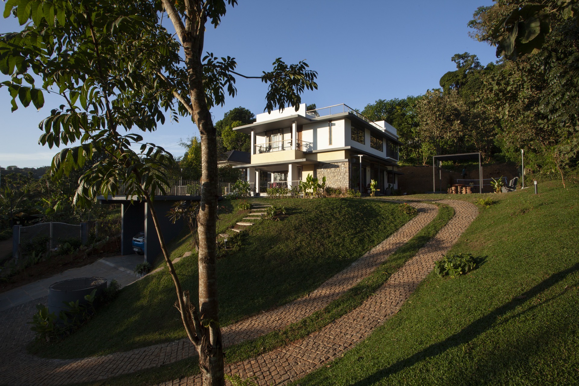 Day facade of a serene farm-side retreat in Mananthavady, Wayanad
